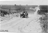 Moore in Lexington car climbing Bunker Hill in Kansas at 1909 Glidden Tour
