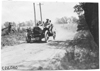 Gregory in Moline car on rural road near Junction City, Kan., at 1909 Glidden Tour