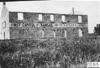 Building labeled "First Capitol of Kansas" near Fort Riley, Kan., at 1909 Glidden Tour
