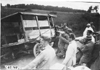 Glidden tourists help right a Firestone truck on rural road near Manhattan, Kan., at 1909 Glidden Tour