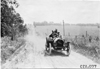 John Wicks in Moline car on rural road near Manhattan, Kan., at 1909 Glidden Tour