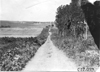 View of rural road and countryside near Manhattan, Kan., at 1909 Glidden Tour