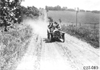 H. Bill in Chalmers car on rural road near Manhattan, Kan., at 1909 Glidden Tour