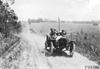 Van Dervoort in Moline car on rural road near Manhattan, Kan., at 1909 Glidden Tour