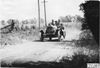 John C. Moore in Lexington car on rural road near Manhattan, Kan., at 1909 Glidden Tour