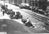 Line up of cars on city street in Kansas City, Mo., at 1909 Glidden Tour