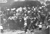 Large crowd surrounds Glidden tourist vehicles at Kansas City, Mo., at 1909 Glidden Tour