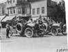 Studebaker cars on cobblestone street in Kansas City, Mo., at 1909 Glidden Tour