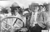 Walter Winchester and unidentified man posed in Pierce car, at 1909 Glidden Tour