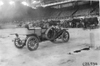 Chalmers car, among others, parked inside the convention hall at Kansas City, Mo., at 1909 Glidden Tour