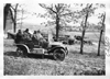 E.M.F. car passing farm, on pathfinder tour for 1909 Glidden Tour