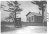 E.M.F. car passing a school, on pathfinder tour for 1909 Glidden Tour