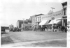 E.M.F. car on city street in business district, on pathfinder tour for 1909 Glidden Tour