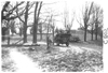 E.M.F. car on muddy rural road, on pathfinder tour for 1909 Glidden Tour