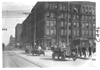 E.M.F. car on city street in business district, on pathfinder tour for 1909 Glidden Tour