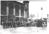 E.M.F. car in front of stone building, on pathfinder tour for 1909 Glidden Tour