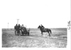 E.M.F. car on rural road encounters man on horseback, on pathfinder tour for 1909 Glidden Tour