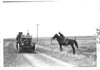 E.M.F. car on rural road encounters man on horseback, on pathfinder tour for 1909 Glidden Tour