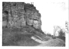 E.M.F. car on mountain road passing rock formation, on pathfinder tour for 1909 Glidden Tour