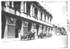 E.M.F. car in front of stone building, on pathfinder tour for 1909 Glidden Tour