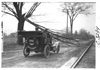E.M.F. car blocked by fallen tree limb on road, on pathfinder tour for 1909 Glidden Tour