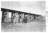 E.M.F. car approaching railway trestle from below, on pathfinder tour for 1909 Glidden Tour