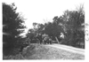 E.M.F. car crossing a small bridge, on pathfinder tour for 1909 Glidden Tour