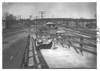 E.M.F. car going up wooden ramp, on pathfinder tour for 1909 Glidden Tour