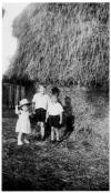Old straw stack with children
