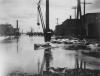 Flooded industrial area with machinery , Lansing, 1904