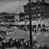 View of North Washington Avenue with women in parade, 200 Block, Lansing