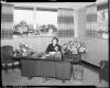 Businesswoman behind desk at Klose Electric Company