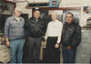 Subjects are, from left to right: Unknown, Jim Zubkus (Plant Manager), Unknown, Ed Evert.  