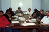 Meeting of the UAW Chaplain Committee. Subjects are, from left to right: Unknown, Martha Adams, Unknown, David Brown, Doug Gross, Kirklin Hall, Walt Saxton, Keith Hartman; all UAW members and several are ordained ministers.  