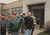 Melling Drop Forge in Lansing, MI., site of a strike against Melling by UAW local 724 approximately 2001-2002.  The subjects in the photo are members of UAW 724, UAW 602 and some Flint area UAW members supporting of the strikers.  Subjects are, from left to right:  Doug Taylor (mostly hidden), Jim Keller, Ken Michaud, hidden behind Michaud – Unknown, Gerald Taylor, hidden behind Taylor – Unknown, Unknown, Reuben Burkes (UAW Region 1-C Director, Unknown, Garry Bernath, Unknown.