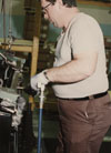 Vic Voisinet performing a production operation.