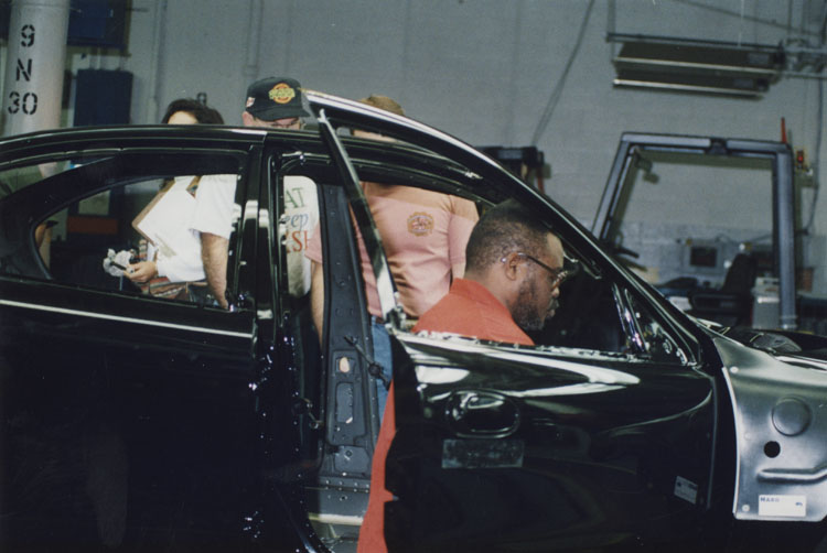 image of Eddies Gentry assembling a vehicle.